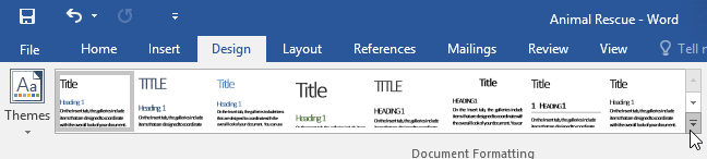 mengklik tombol More dalam kelompok Document Formatting