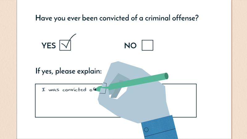 A job applicant writing out why they were convicted of a criminal offense. 